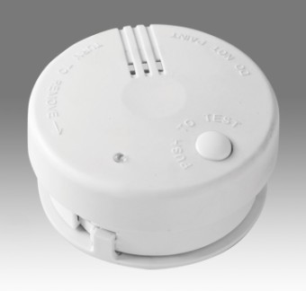 How to standardize the installation of carbon monoxide alarms and what should be avoided?